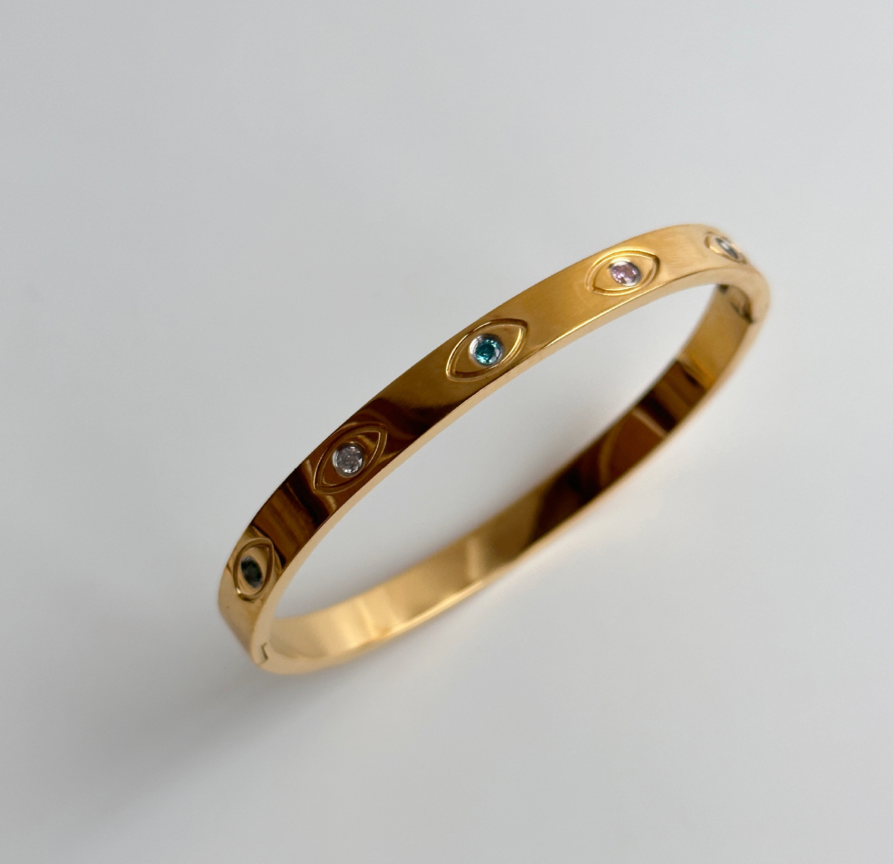 Modern Minimalist Round Bangle – Titanium Steel, 18K Gold Plated with Zircon