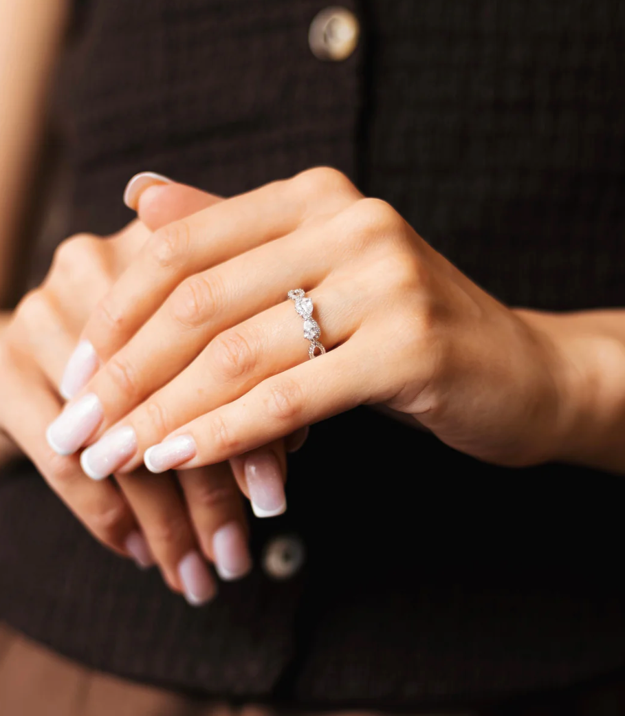 Rhodium Plated Infinity Ring with CZ – Adjustable Size 7–8